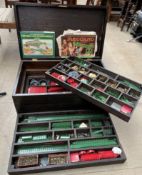 A Chest of Meccano divided into four trays together with assorted books / pamphlets