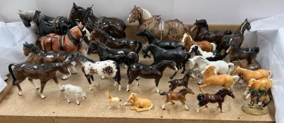 A Beswick appaloosa horse together with other Beswick model horses and other horses