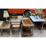 A walnut coffee table together with a similar nest of tables, a galleried tea trolley,