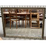 A large gilt framed rectangular wall mirror,