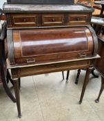 A continental mahogany cylinder bureau,