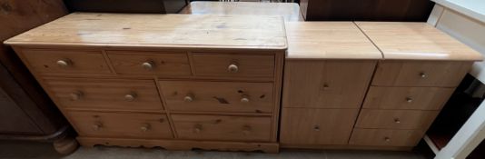 A modern pine chest of seven drawers together with a modern filing cabinet and a matching chest of