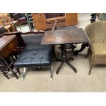 A Victorian table with a rectangular top on a baluster column and four splayed legs together with a