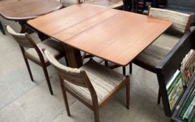 A mid 20th century teak gateleg dining table and four chairs