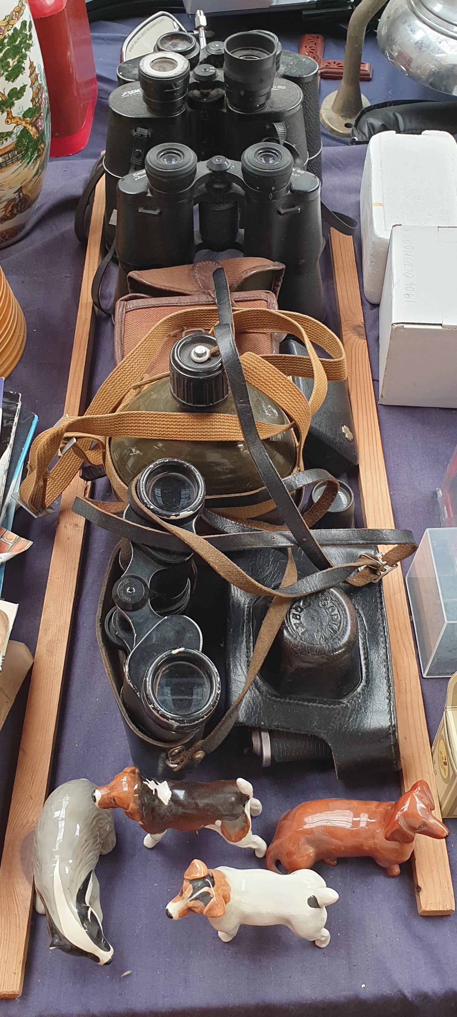 Various binoculars together with cameras and Beswick dogs etc