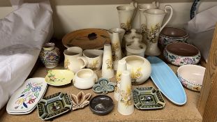 A collection of Purbeck Ceramics, together with Poole pottery bowls, vases and plates,