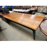 A large pine refectory table with a planked rectangular top on ring turned legs,