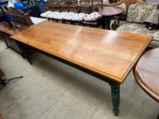 A large pine refectory table with a planked rectangular top on ring turned legs,