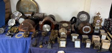 A 19th century gilt metal mantle clock together with a large quantity of clocks,