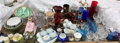 A Murano glass clown together with coloured glass vases and jugs, drinking glasses,