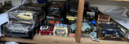 A collection of Burago, Maisto and other toy cars etc including a Volkswagen Beetle, Lancia Aurelia,