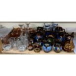 Carnival glass bowls together with copper lustre jugs, pottery jugs, glass vases,