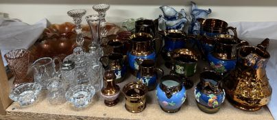Carnival glass bowls together with copper lustre jugs, pottery jugs, glass vases,