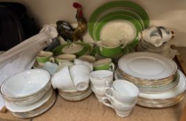 A Tams ware part dinner set together with a cockerel figure,