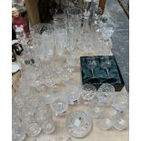 Cut glass decanters together with drinking glasses, jugs,