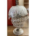 A cut glass table lamp,