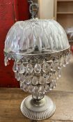 A cut glass table lamp,
