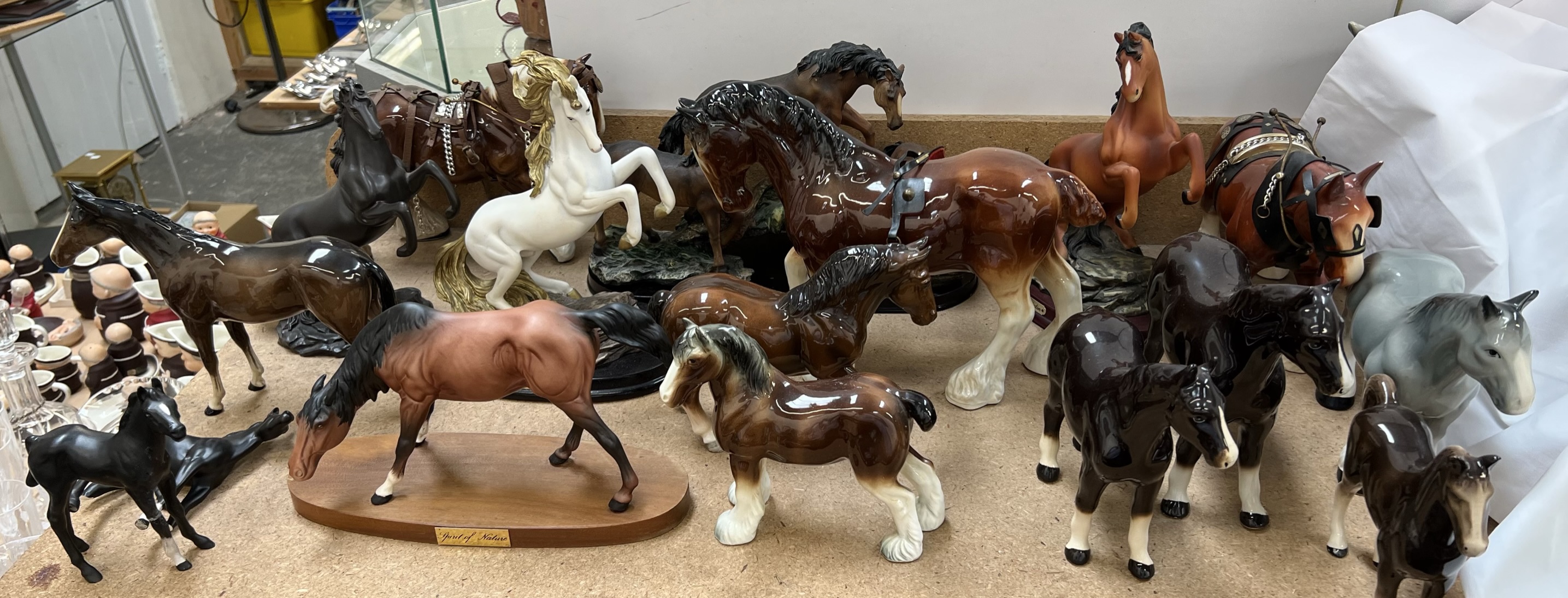 A Spirit of Nature porcelain horse together with a collection of models of horses