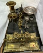 A Victorian brass desk standish with a Chinese attendant in front of two cornucopia ink wells