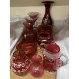 Assorted cranberry glass including vases, jugs,