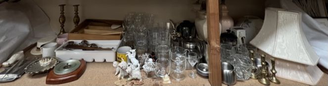 Various table lamps together with drinking glasses, flatwares,