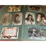 A postcard album containing circa 170 postcards mainly portrait and comic