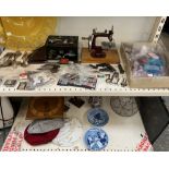 Assorted stamps together with a miniature sewing machine, jewellery box, feathers, clock,