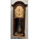 A 20th century mahogany wall clock,