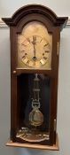 A 20th century mahogany wall clock,