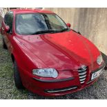 A 2002 Alfa Romeo 147 T Spark, in red, estimated mileage 4734, 1598cc, registration number CA02 RXB,