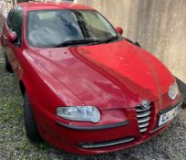 A 2002 Alfa Romeo 147 T Spark, in red, estimated mileage 4734, 1598cc, registration number CA02 RXB,
