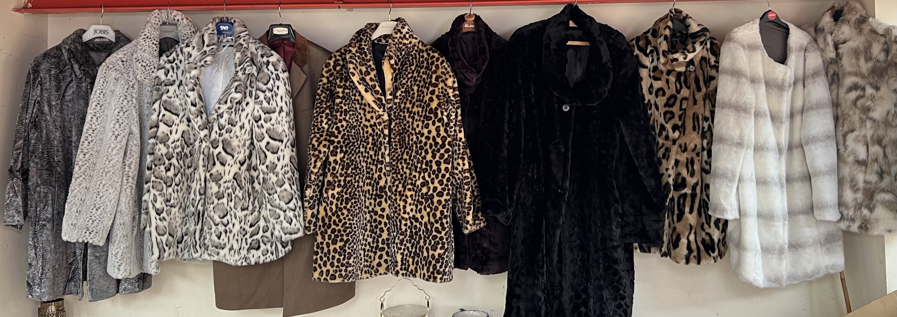 A collection of ladies faux fur and other jackets including David Emanuel,