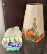 A Clarice Cliff Bonjour pattern preserve pot and cover painted with flowers and leaves,