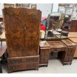 An early 20th century walnut wardrobe with a matching dressing table