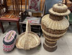 A Wicker Ali Baba lidded basket together with a swing handled basket and another case