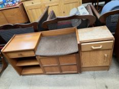 A mid 20th century Nathan teak telephone table together with a G-Plan bedside cabinet