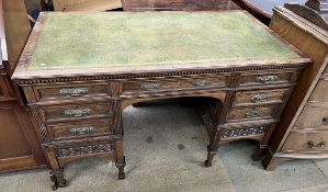 An Edwardian pedestal desk,