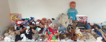 A large collection of TY Beanie Babies together with with other toys,