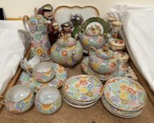 A Japanese part tea set decorated with flowers together with two Royal Doulton Toby jugs,