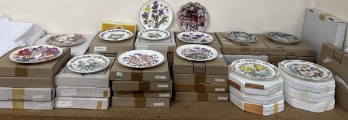 A large collection of Bradford Exchange collectors plates, boxed including Royal Albert,