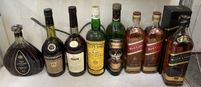 Spirits - a bottle of Johnnie Walker Black Label, two bottles of Johnnie Walker Red Label,