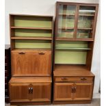 Two G-Plan teak wall units, one with shelves, drinks cabinet and cupboard doors,