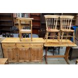 A pine dresser together with a kitchen pine table,