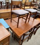 A mid 20th century White and Newton Ltd teak dining suite comprising an extending dining table six