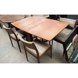 A mid 20th century teak gateleg dining table and four chairs