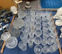 Glass decanters together with drinking glasses etc