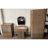 An early 20th century limed oak three piece bedroom suite