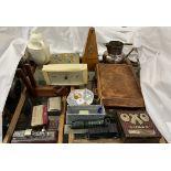 A metronome, teak book rest from SMS Birmingham, together with tins, barometer,