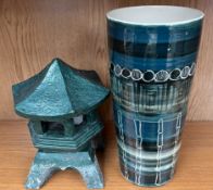 A Rumney pottery vase together with a solar light
