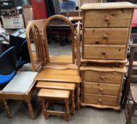 A pair of pine bedside cabinets together with a pine nest of tables a pine dressing table mirror